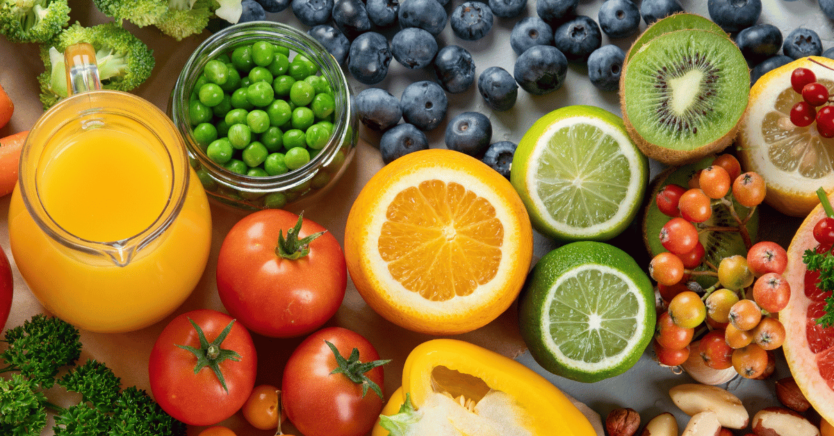 Various fruits and vegetables on a table.