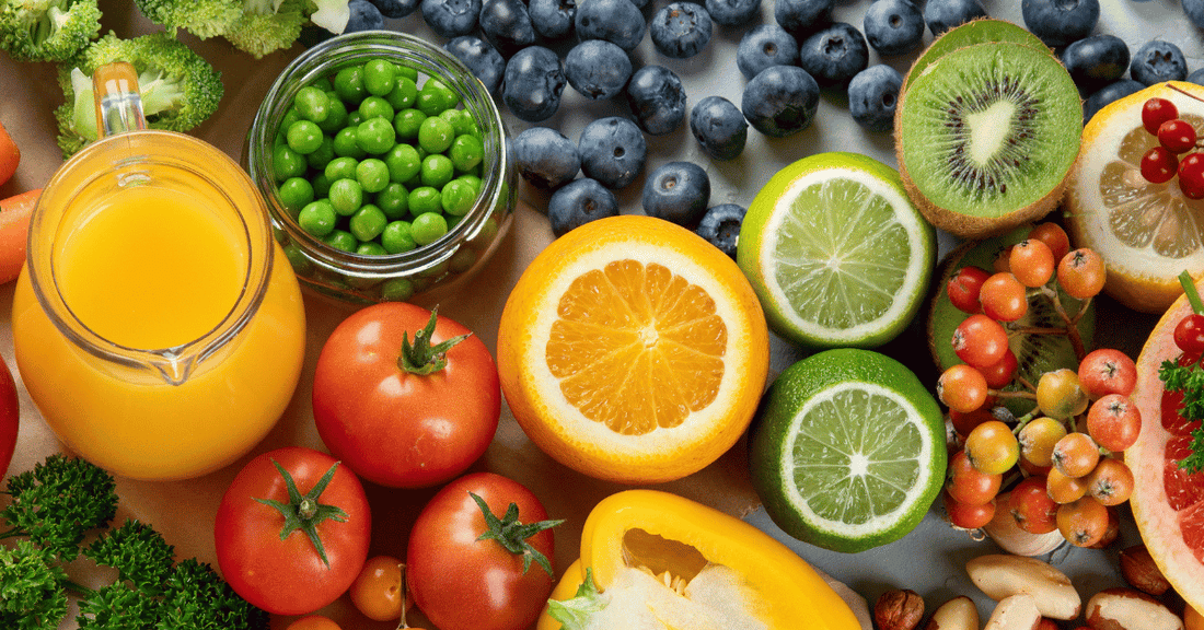 Various fruits and vegetables on a table.