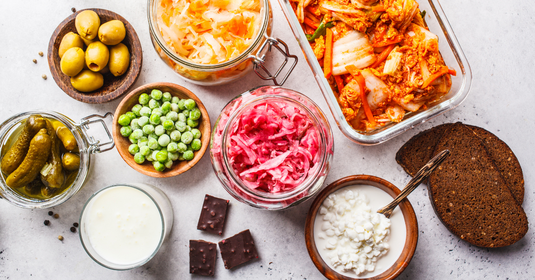 Prebiotic and probiotic foods on a white surface.