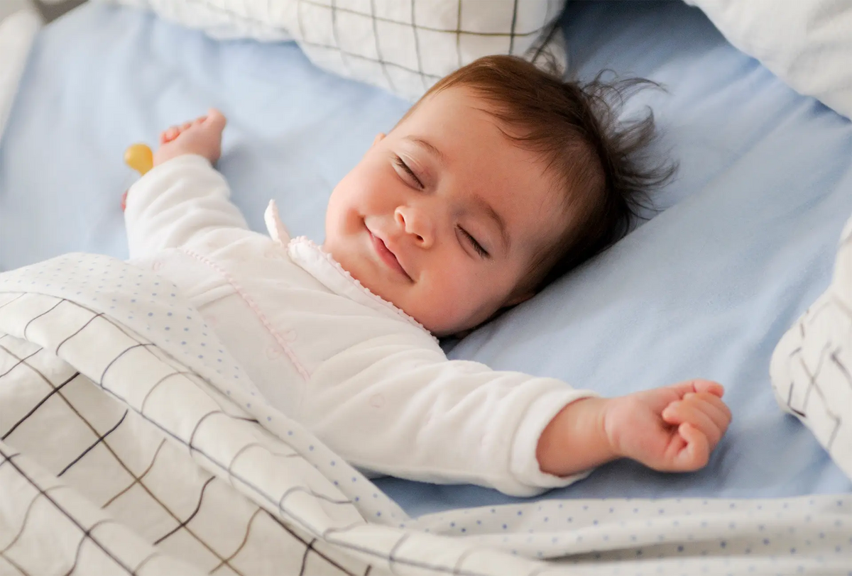 A child resting in bed